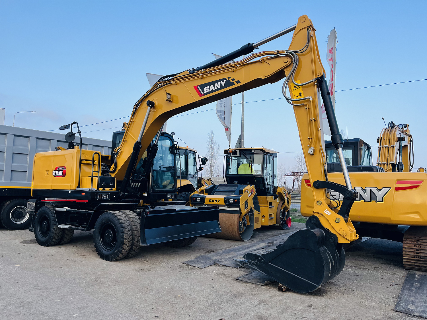 экскаватор колесный sany sy185w с аутригерами и отвалом Колесные экскаваторы Sany